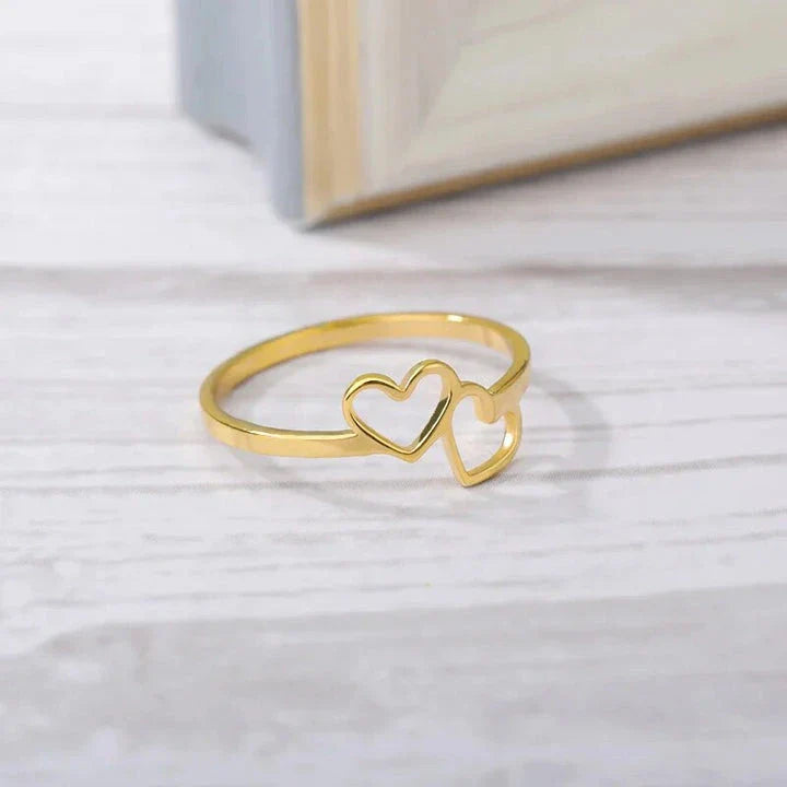 Elegant heart-shaped love ring in stainless steel and copper, a timeless and versatile piece of bridal jewellery