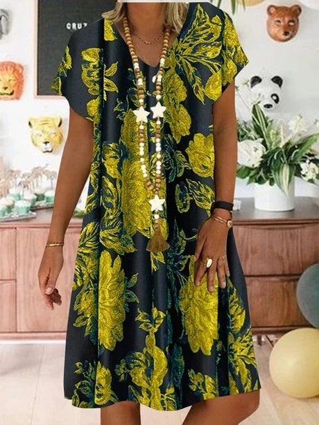 Elegant A-line dress with V-neckline and vibrant print, perfect for formal occasions and everyday wear