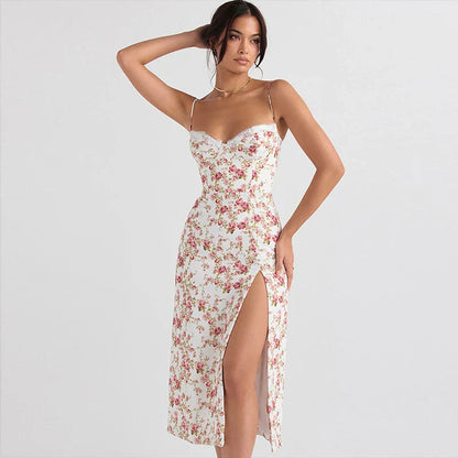 Elegant floral midi dress with slit, adjustable suspender straps, and luxurious polyester fabric for a sophisticated summer look.