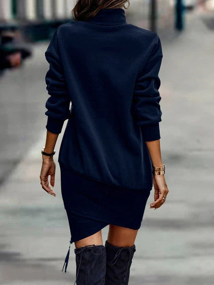 Elegant long sleeve midi dress in various colours, featuring a high neck design and waist cutout detail