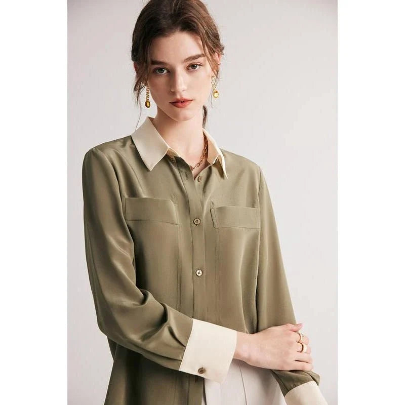 A chic and elegant silk crepe de chine blouse in a timeless solid pattern, perfect for professional and casual wear.