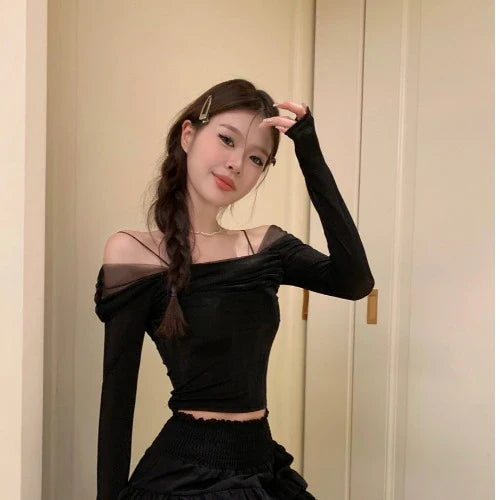 Elegant black off-shoulder blouse made of French-inspired polyester mesh fabric
