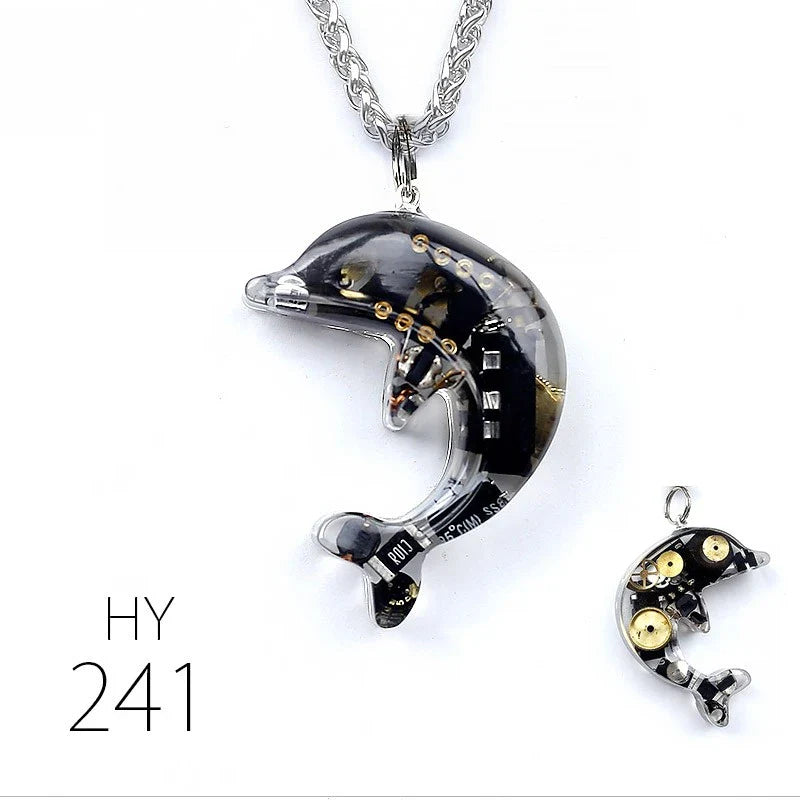 Steampunk-inspired dolphin pendant necklace with electronic components and brass accents