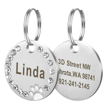 Customisable stainless steel pet ID tags in various colours, designed for identifying and protecting your beloved companion