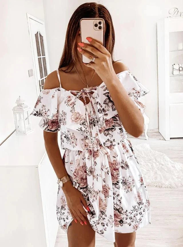 A stylish floral print dress with a flattering waist design, perfect for professional commuting
