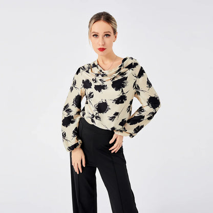 Elegant ladies' blouse with a printed pattern, dropped collar, and long sleeves in a classic white colour