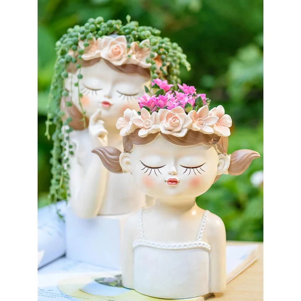 A charming 7.8-inch resin planter in the shape of a fairy girl, perfect for displaying succulents and adding whimsical decor to your home or office.