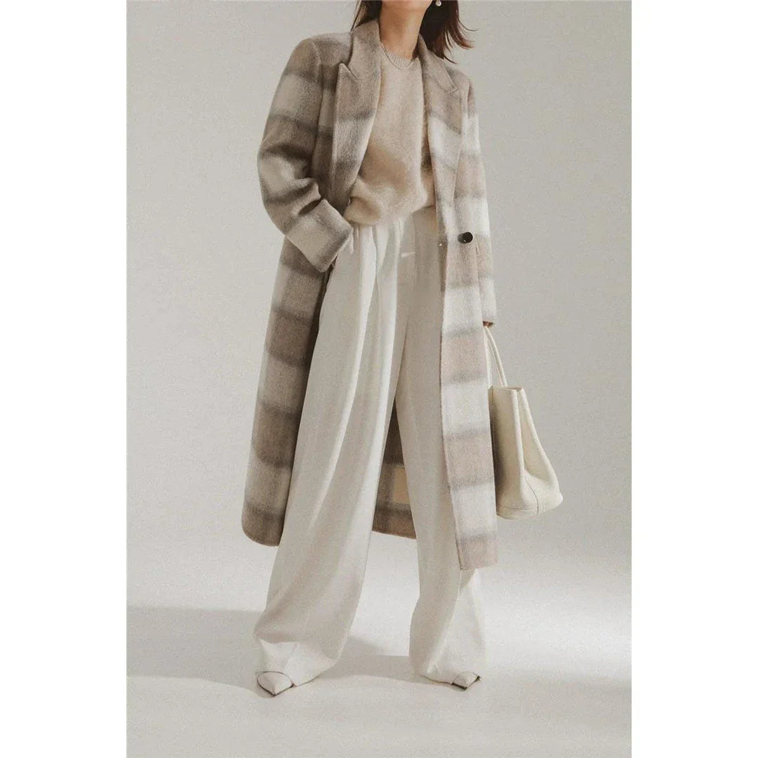 Elegant plaid double-breasted long woollen coat for women, featuring a premium blend of wool, cotton and polyester for exceptional quality and warmth.