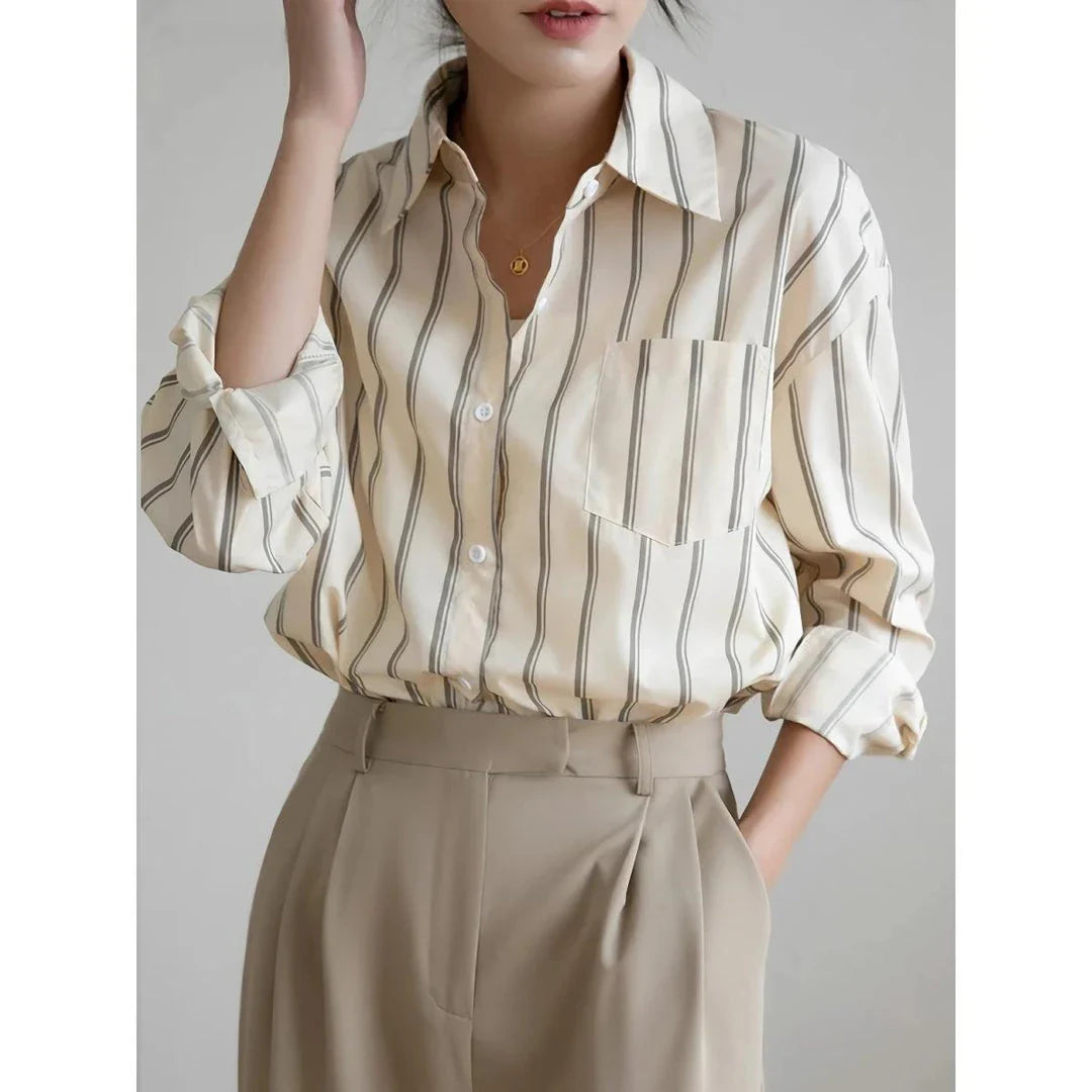 Elegant striped office blouse with chic drop shoulder design, made from premium polyester-cotton blend for durability and comfort