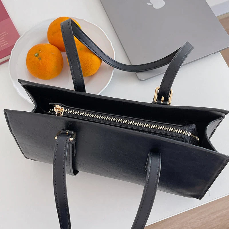 A premium polyester tote bag in a variety of colours, featuring a stylish Japanese and Korean-inspired design for the modern British shopper.