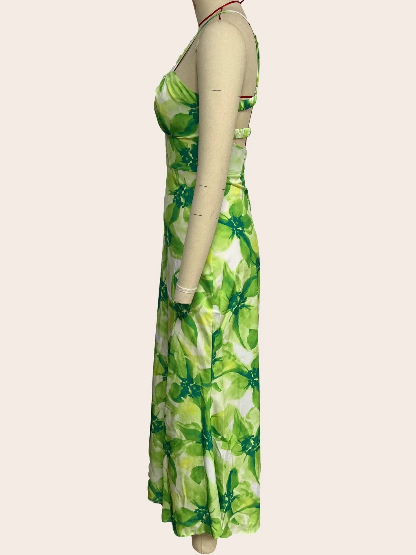 Elegant floral midi dress with backless design, available in yellow, purple, and green colours