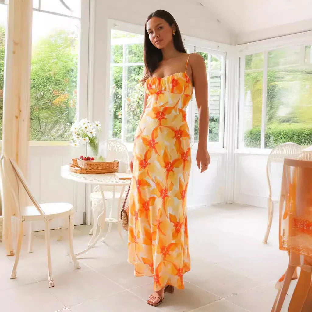Elegant floral midi dress with backless design, available in yellow, purple, and green colours