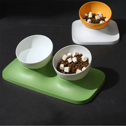 Adjustable anti-spill double bowl feeding station with neck guard for cats and dogs