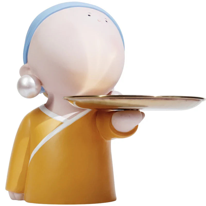 Elegant decorative tray with a detailed resin sculpture of a girl wearing pearl earrings, perfect for storing keys and trinkets in the living room entryway