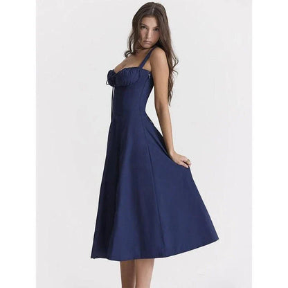 Elegant backless midi sundress in blue, featuring a stylish high split and mid-calf length for a sophisticated summer look.