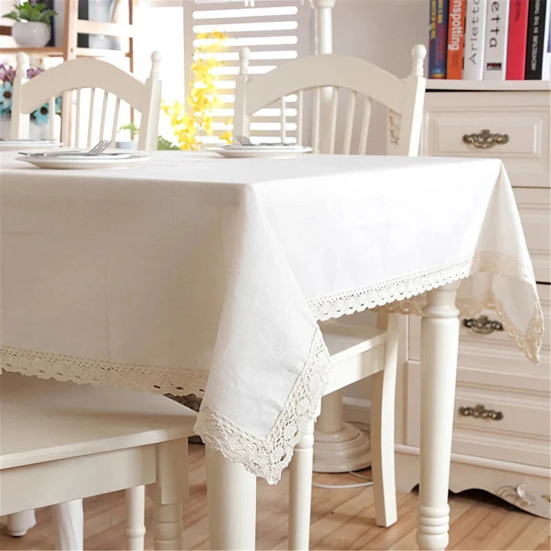 Elegant polyester linen tablecloth with delicate lace edging, available in various sizes for a sophisticated dining experience.