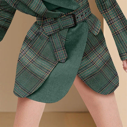 Premium plaid suit jacket for women, featuring a sophisticated design, expert tailoring, and a touch of feminine skirt-like detailing.