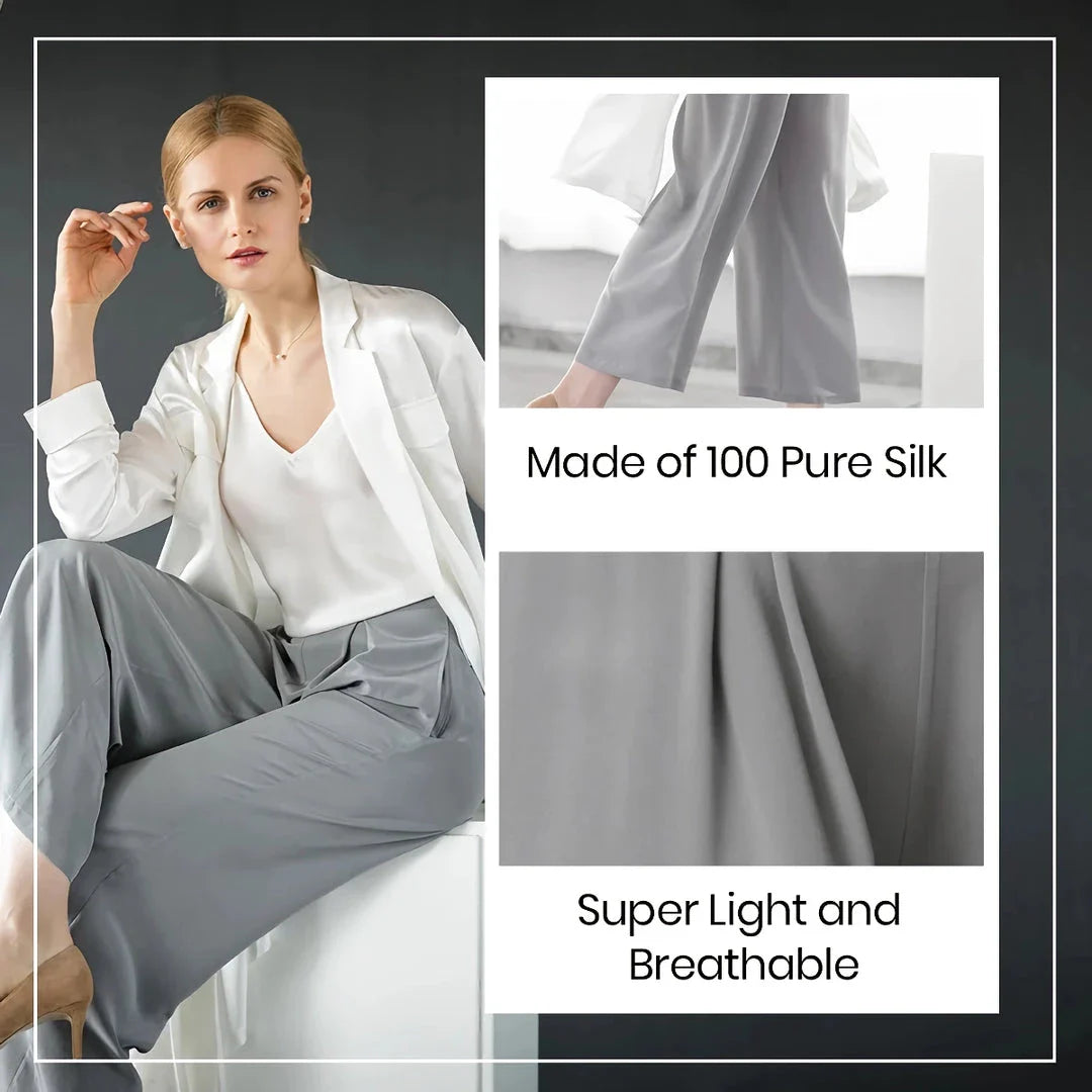 Chic silk wide-leg trousers in a sophisticated grey colour, featuring a high-waist design and relaxed fit for all-day comfort and style.
