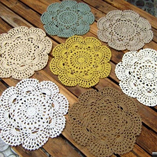 Handcrafted crochet placemats in various classic colours, showcasing the timeless elegance of British craftsmanship
