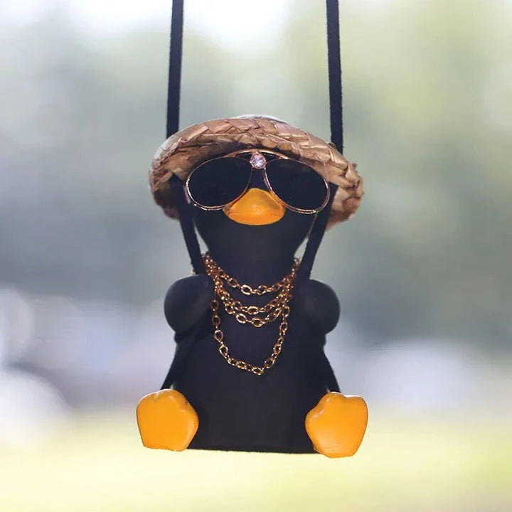 Charming swinging duck car accessory with guitar and coke-themed design, offering a unique and personalized driving experience