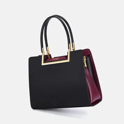 Elegant premium genuine leather tote bag with spacious interior, multiple compartments, and a secure zipper closure for everyday use