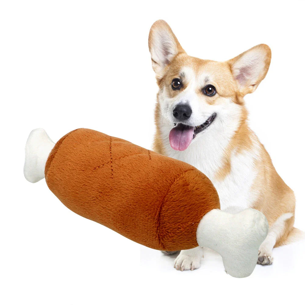 Adorable plush squeaky toys in various shapes and colours, including Pig, Duck, Elephant, and Chicken Legs, for playful pets