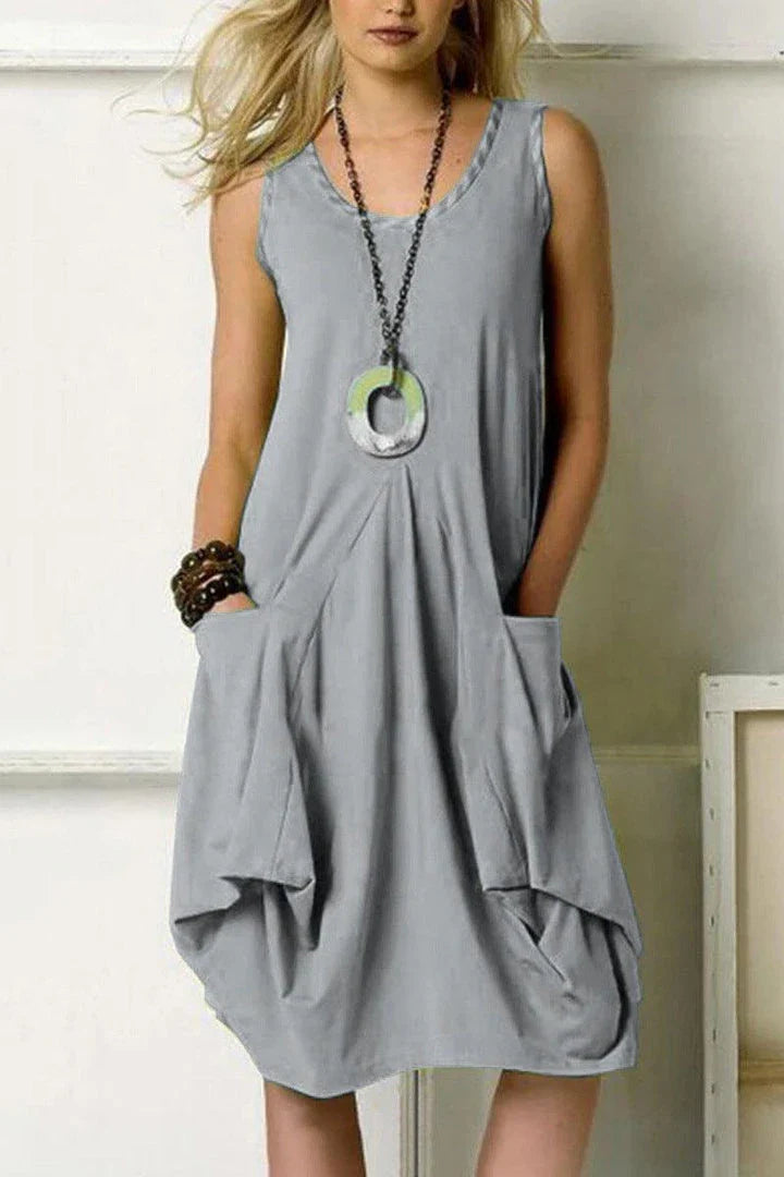 Stylish irregular knit dress in orange made from premium polyester fabric, perfect for the modern British woman's wardrobe