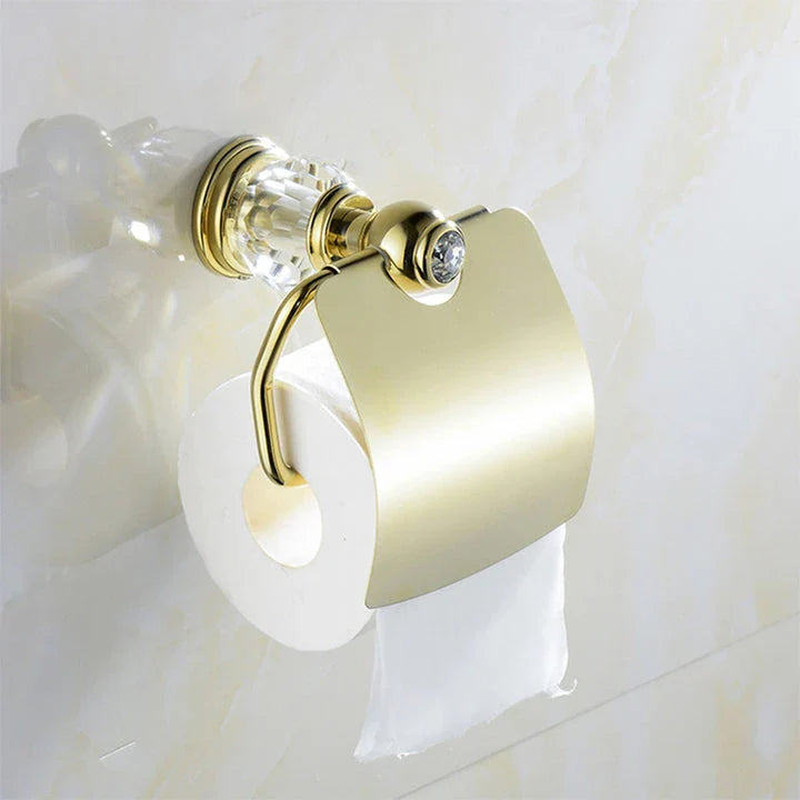 Elegant gold brass toilet roll holder with crystal decorations for a luxurious bathroom accessory