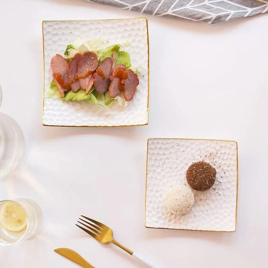 Elegant embossed ceramic cake plate in white color, perfect for serving cakes and pastries during afternoon tea