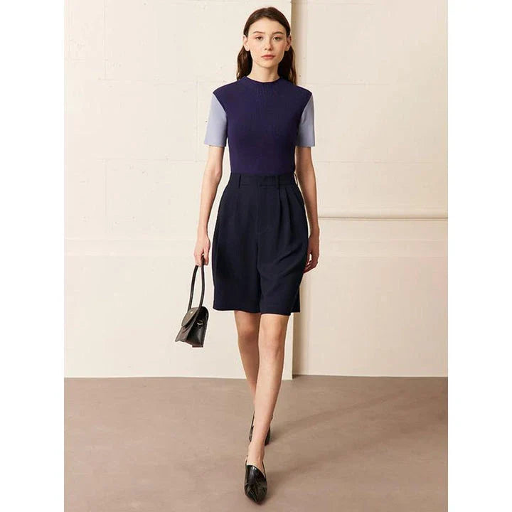 Elegant wide-leg shirred shorts in deep blue, designed for the modern British woman