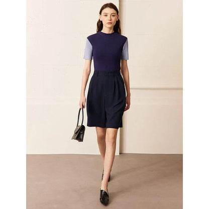 Elegant wide-leg shirred shorts in deep blue, designed for the modern British woman