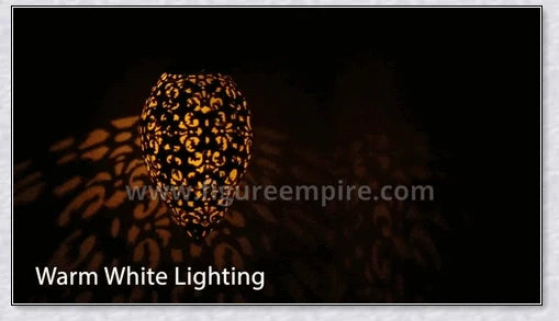 Decorative outdoor solar lanterns hanging in a lush garden, providing warm, ambient lighting