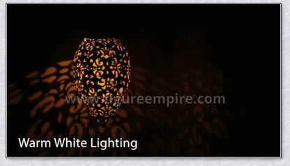 Decorative outdoor solar lanterns hanging in a lush garden, providing warm, ambient lighting