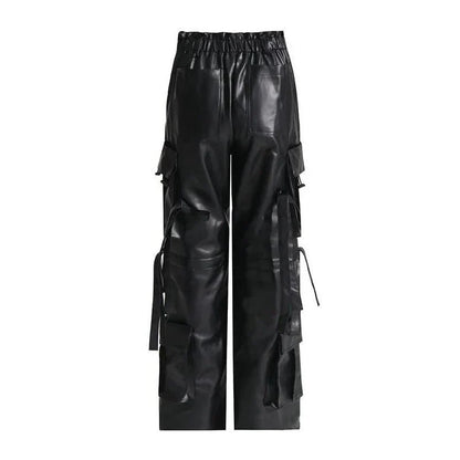 A pair of high-waist leather cargo pants with a stylish patchwork design, offering a blend of functionality and fashion for modern women.