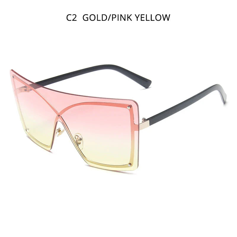 Stylish oversized flat top sunglasses with a rimless design, providing UV protection and a comfortable fit for the modern British woman