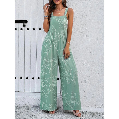 Elegant wide-leg jumpsuit with geometric print and suspenders, perfect for the fashion-conscious British woman