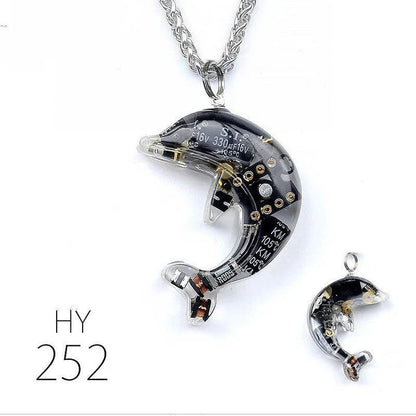 Steampunk-inspired dolphin pendant necklace with electronic components and brass accents