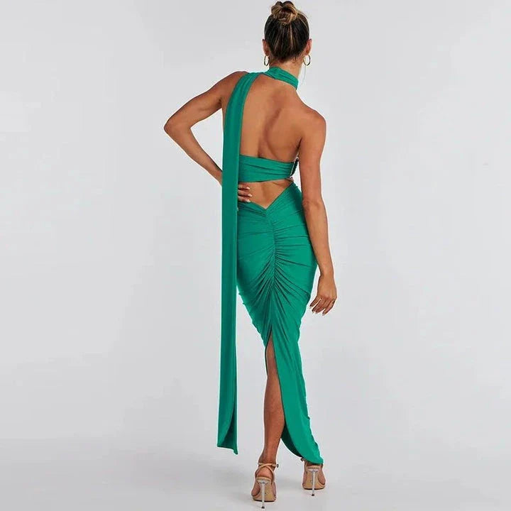 Elegant backless cocktail dress set with halter crop top and maxi skirt, perfect for summer events and occasions