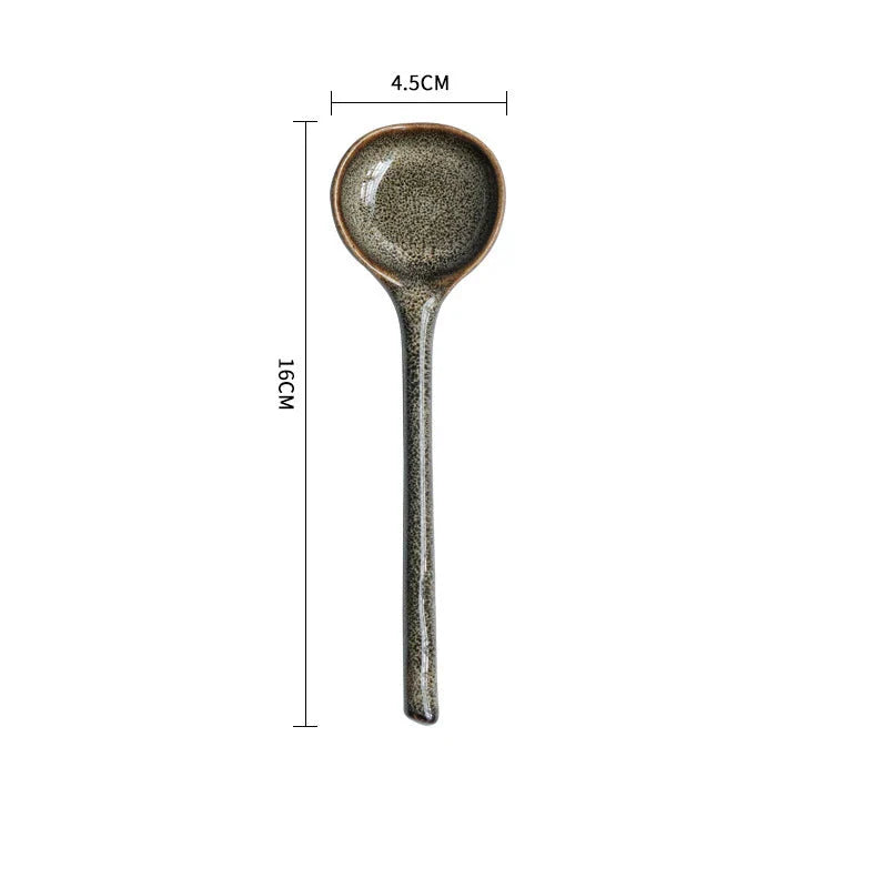 Elegant British ceramic soup spoon with long handle and vibrant glaze for refined dining experience