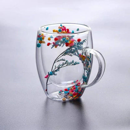 Elegant double-walled glass tea mug with a captivating floral design, ideal for hot and cold beverages