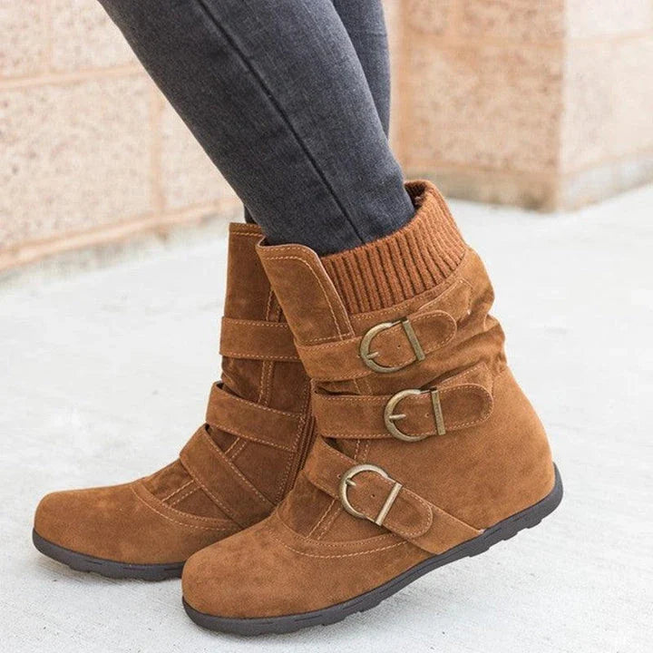 Durable cotton boots with resilient rubber soles, stylish car-stitch detailing, and cushioned artificial hair insole for all-day comfort.