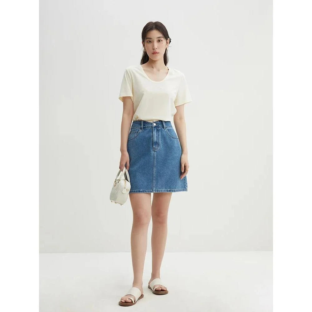 Chic high-waisted denim skirt in a classic blue shade, featuring an A-line silhouette and a flattering empire waistline.