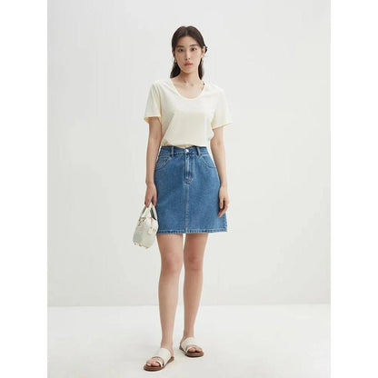 Chic high-waisted denim skirt in a classic blue shade, featuring an A-line silhouette and a flattering empire waistline.