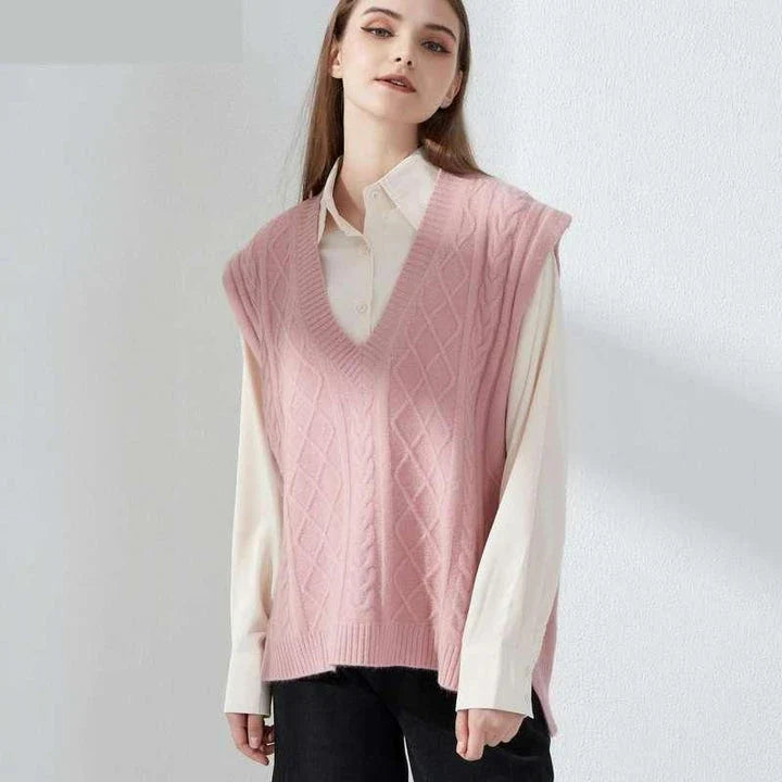 Cosy oversized knitted vest in various colours, featuring a sleeveless V-neck design for versatile layering