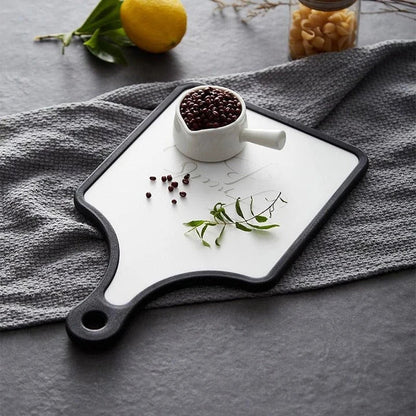 Premium walnut wood cutting boards in rectangle, handle, and round shapes for versatile kitchen use