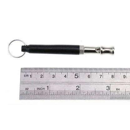 Compact ultrasonic dog training whistle with durable metal and plastic construction for effective communication and reliable performance