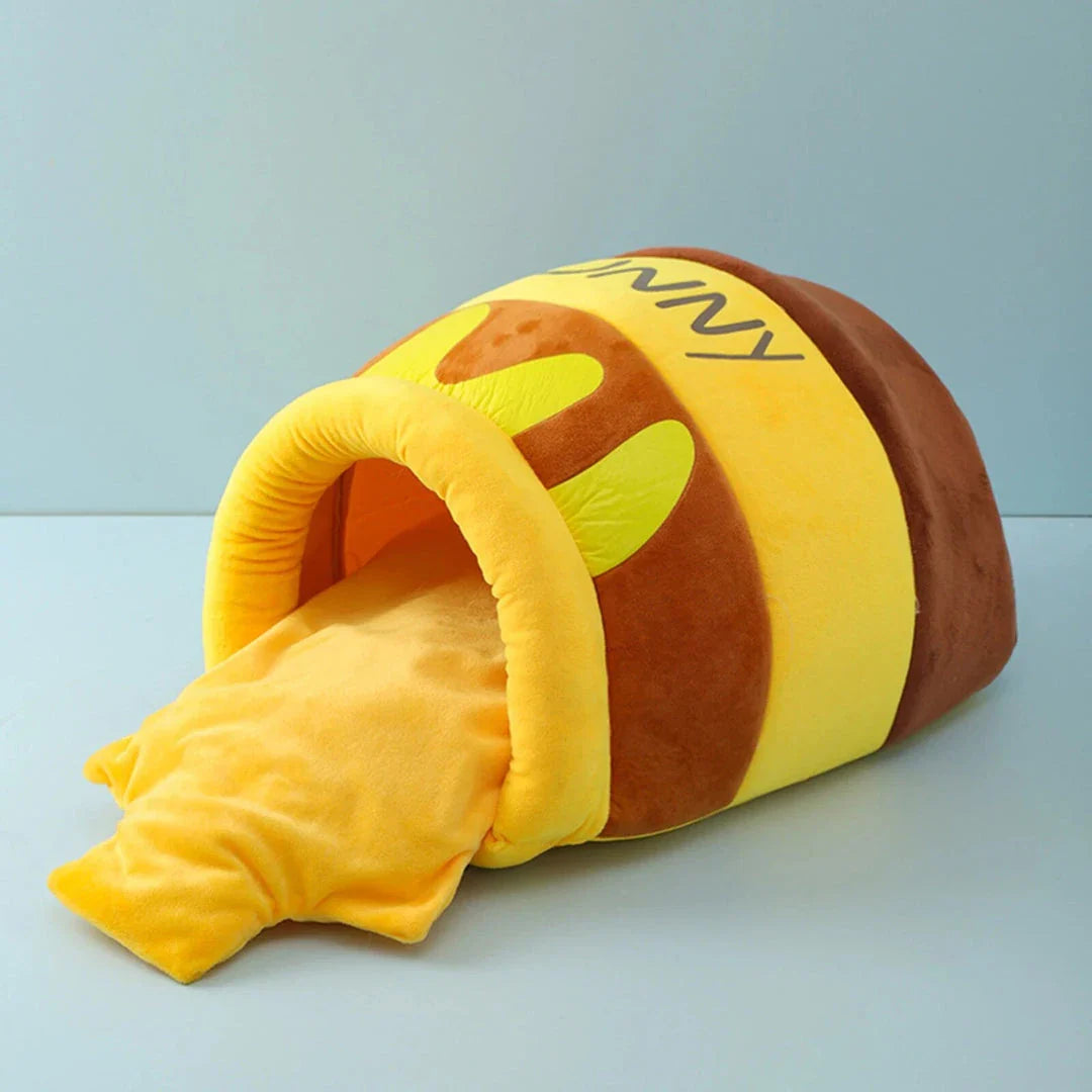 Cosy honey pot-shaped cat bed made of plush velvet material for comfort and warmth