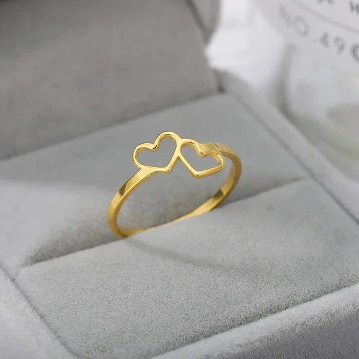 Elegant heart-shaped love ring in stainless steel and copper, a timeless and versatile piece of bridal jewellery