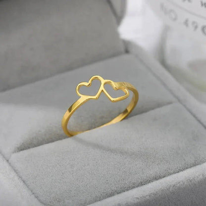 Elegant heart-shaped love ring in stainless steel and copper, a timeless and versatile piece of bridal jewellery