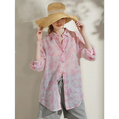 Elegant floral print ramie blouse for professional women, featuring a charming pattern, breathable fabric, and a polished silhouette.